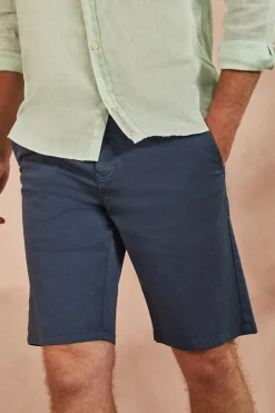 Bermuda relajada azul denim con logo bordado