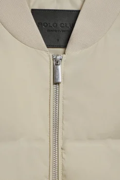 Bomber acolchada beige Dubái con detalle Polo Club