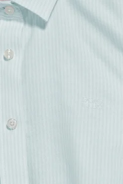 Camisa a rayas color aguamarina con logo bordado