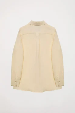 Camisa de lino beige con detalle bordado