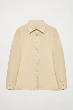 Camisa de lino beige con detalle bordado