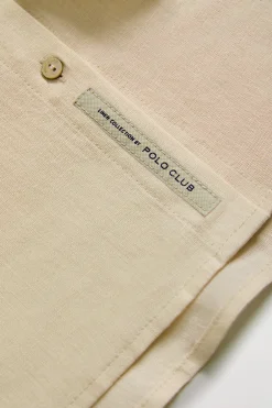 Camisa de lino beige con detalle bordado