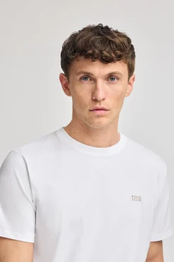 Camiseta blanca básica de cuello redondo con detalle bordado