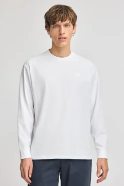 Camiseta blanca holgada con detalle Polo Club
