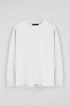 Camiseta blanca holgada con detalle Polo Club