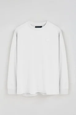 Camiseta blanca holgada con detalle Polo Club