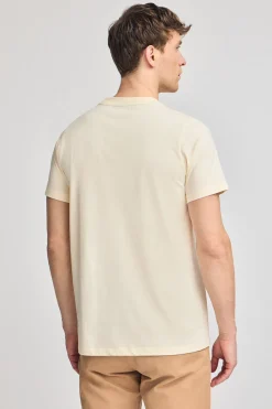 Camiseta color crudo de cuello redondo y Big Rigby Go engomado