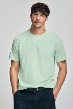 Camiseta color menta de cuello redondo y logo engomado