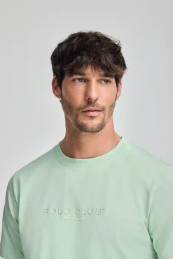 Camiseta color menta de cuello redondo y logo engomado
