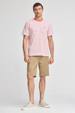 Camiseta de rayas color coral y beige con monograma bordado