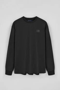 Camiseta negra holgada con detalle Polo Club