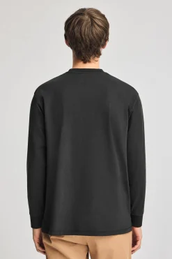 Camiseta negra holgada con detalle Polo Club