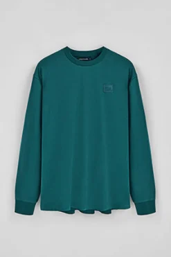 Camiseta verde azulado holgada con detalle Polo Club