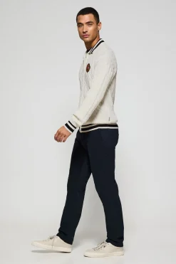 Cardigán beige trenzado con cremallera y logo náutico