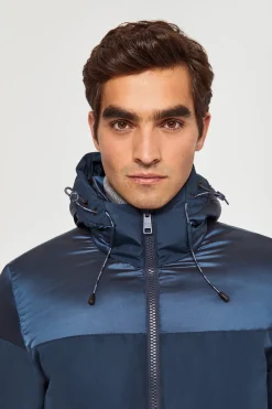 Chaqueta azul petróleo acolchada mate y brillo con parche en la manga
