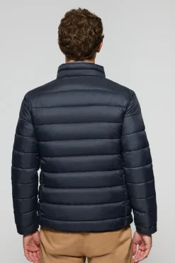 Chaqueta Chase ultralight azul marino con parche Rigby Go