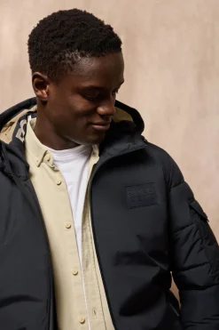 Chaqueta St Moritz azul marino acolchada de capucha fija y detalles Polo Club