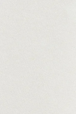 Cárdigan color crudo de punto abotonado con cuello pico y logo Rigby Go