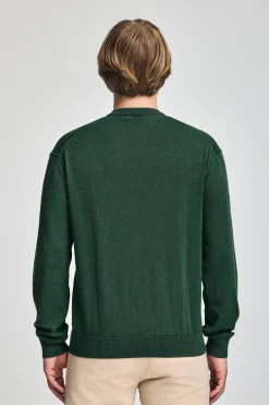 Jersey verde esmeralda garment dye de cuello redondo y logo bordado