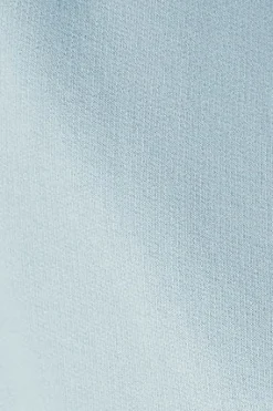 Pantalón corto de algodón azul claro con logo bordado