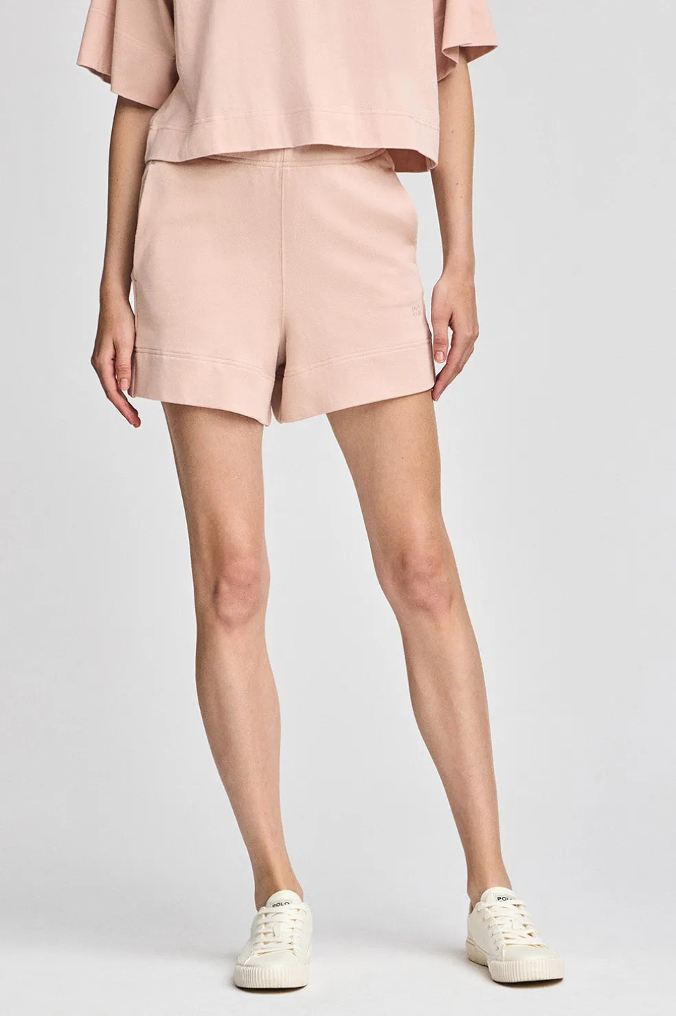Pantalón corto de algodón color maquillaje con logo bordado