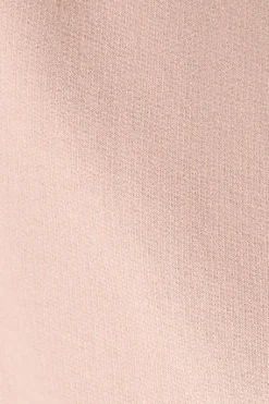 Pantalón corto de algodón color maquillaje con logo bordado