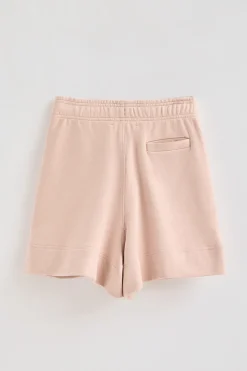 Pantalón corto de algodón color maquillaje con logo bordado