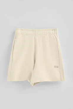 Pantalón corto de algodón color crudo con logo bordado
