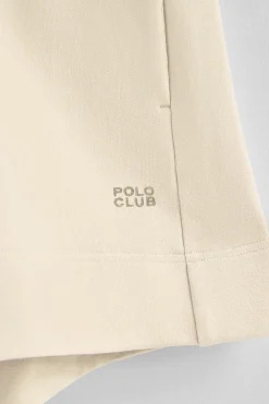 Pantalón corto de algodón color crudo con logo bordado