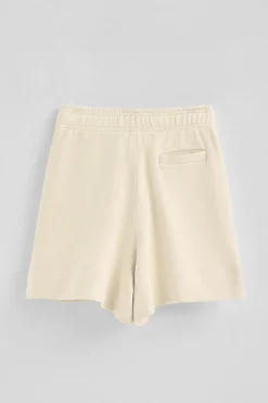 Pantalón corto de algodón color crudo con logo bordado