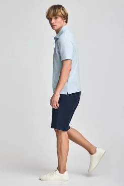 Polo azul claro de manga corta y tres botones con logo bordado Rigby Go