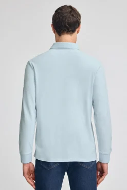Polo azul claro de manga larga de tres botones y bordado Rigby Go