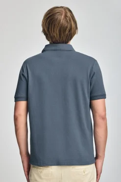 Polo azul denim de manga corta y tres botones con logo bordado Rigby Go