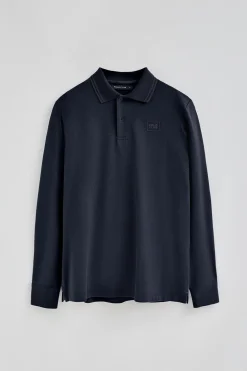 Polo azul marino de manga larga y dos botones con parche logotipado