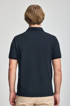 Polo azul marino de manga corta y tres botones con logo bordado Rigby Go
