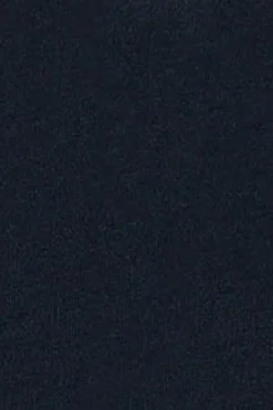 Polo azul marino sin botones y escudo náutico