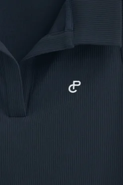 Polo azul marino sin mangas con monograma bordado