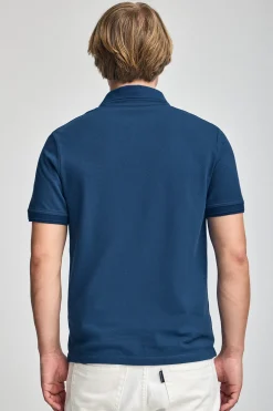 Polo azul índigo de manga corta y tres botones con logo bordado Rigby Go