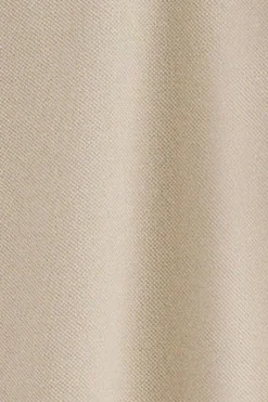 Polo beige de algodón y lino con dos botones y monograma bordado