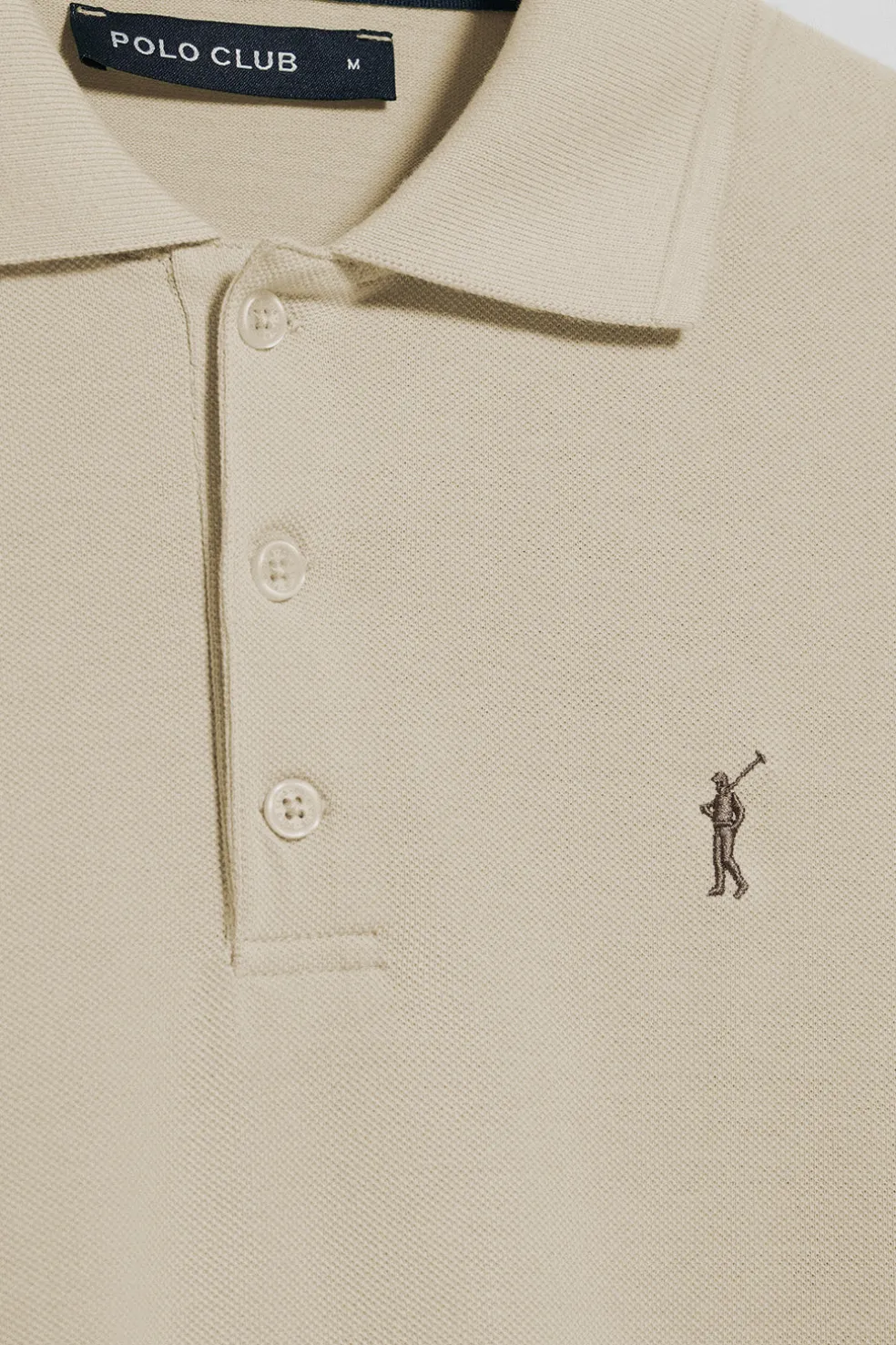 Polo beige de manga corta y tres botones con logo bordado Rigby Go