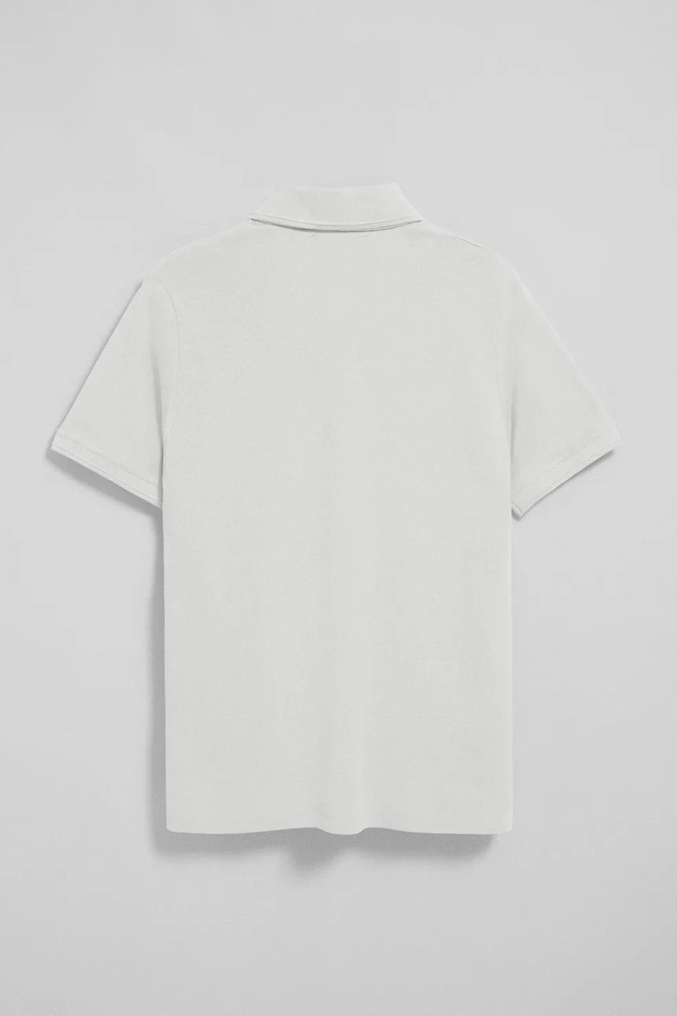 Polo blanco de manga corta y tres botones con logo bordado Rigby Go