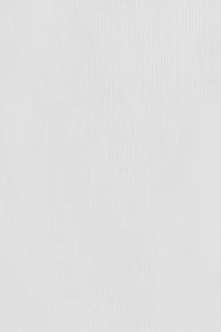 Polo blanco sin mangas con monograma bordado