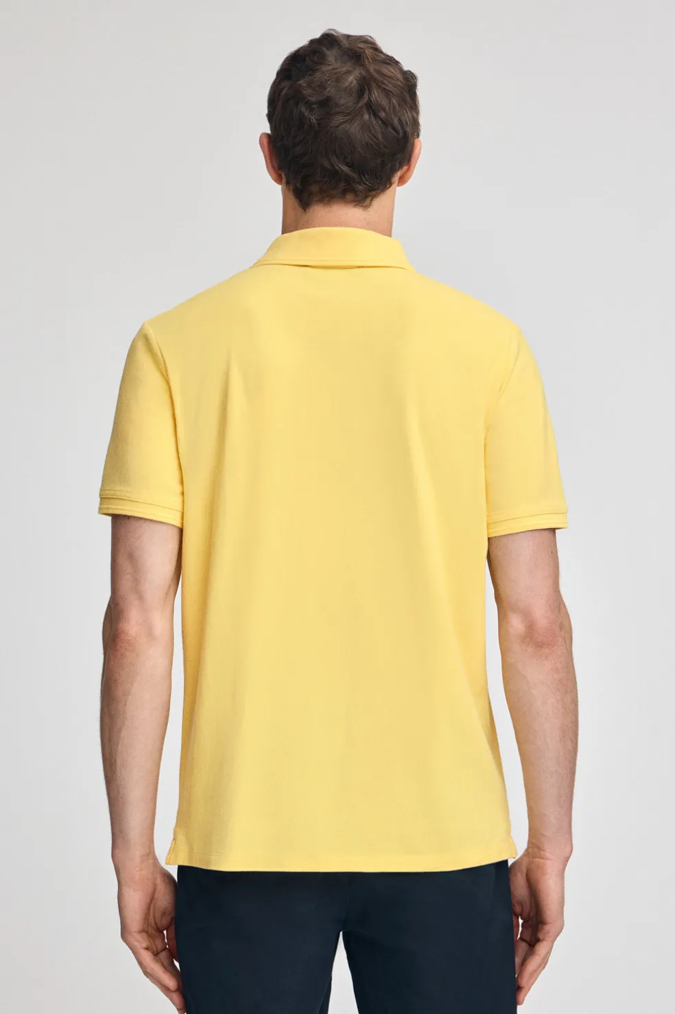 Polo color amarillo claro de piqué de manga corta y bordado Rigby Best