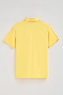Polo color amarillo claro de piqué de manga corta y bordado Rigby Best