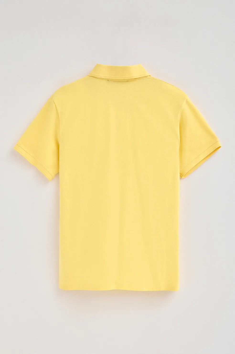 Polo color amarillo claro de piqué de manga corta y bordado Rigby Best