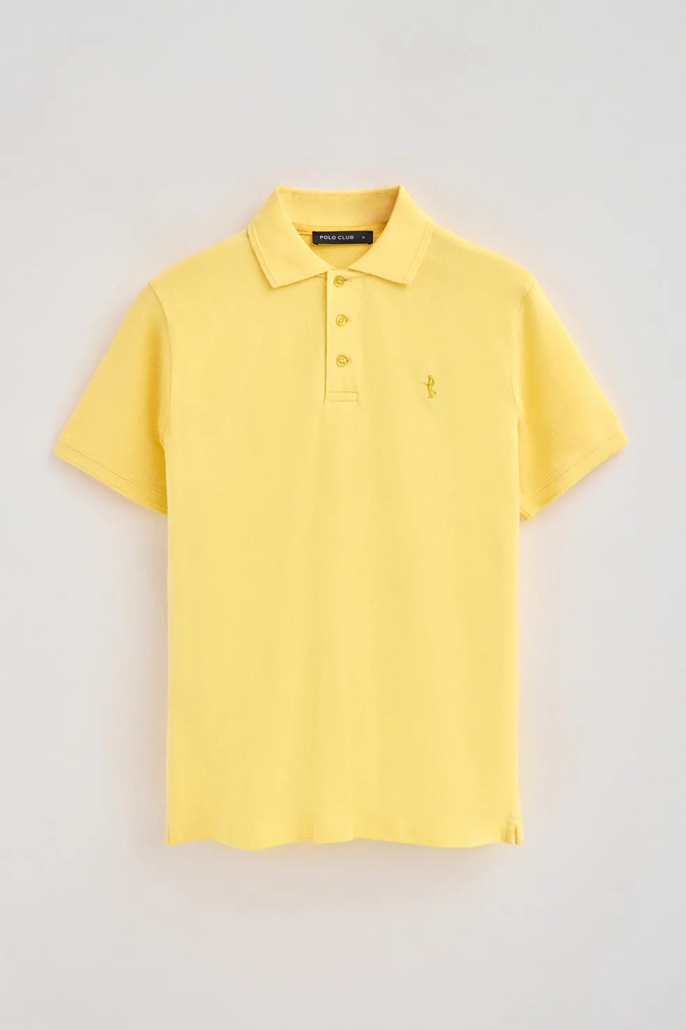 Polo color amarillo claro de piqué de manga corta y bordado Rigby Best