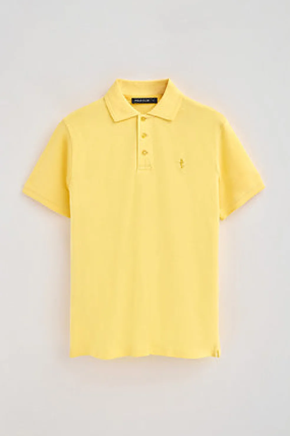 Polo color amarillo claro de piqué de manga corta y bordado Rigby Best