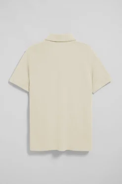 Polo color crudo de manga corta y tres botones con logo bordado Rigby Go
