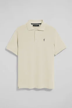 Polo color crudo de manga corta y tres botones con logo bordado Rigby Go