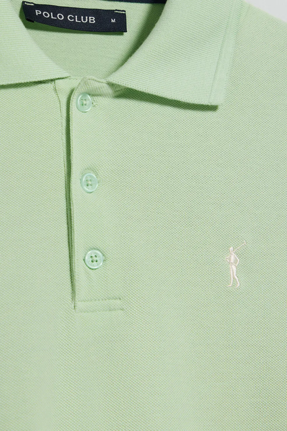 Polo color menta de manga corta y tres botones con logo bordado Rigby Go